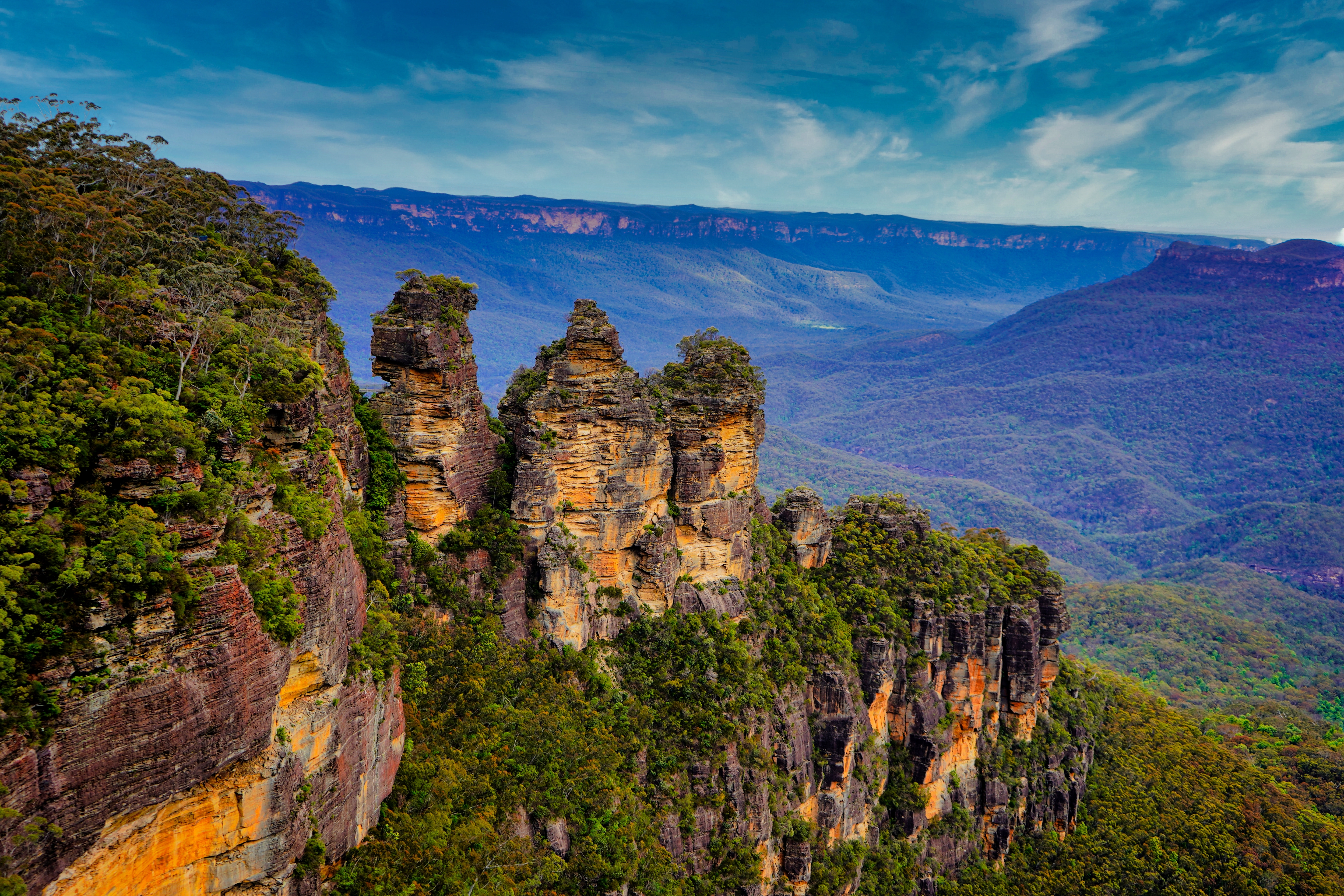 Three Sisters, den majestætiske klippeformation i Blue Mountains, en populær dagstur fra Sydney med spektakulære naturoplevelser