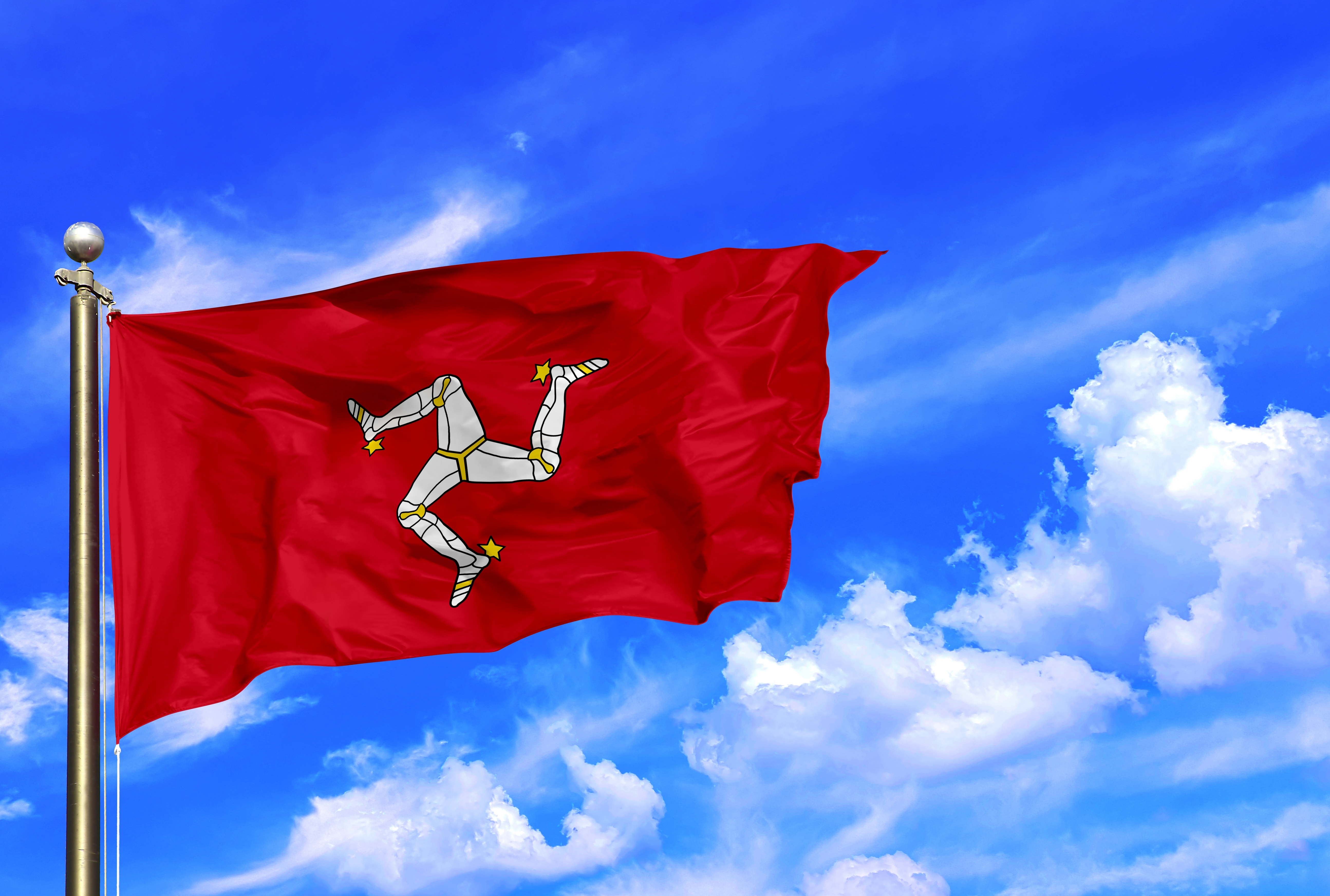 Isle of Man flag med det karakteristiske trebenede triskelion symbol